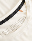 Cuera Active WPC Light Weight T-Shirt in Off White / Army, neck label and care tag detail