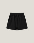 Man wearing Cuera Men's Active Globe Shorts in Black with white t-shirt, front studio view