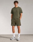 Model wearing Cuera Oncourt 2in1 Shorts in Army, front studio view