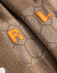Cuera Oncourt Grip Sock in Walnut, neck label and care tag detail