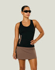 Model wearing Cuera Oncourt Black Slim Tank Top 2-pack, front studio view